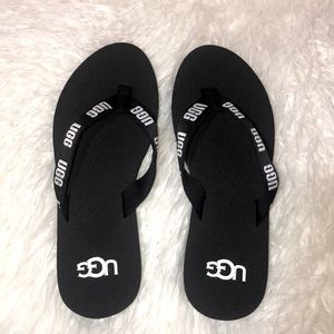 black UGG flip flops